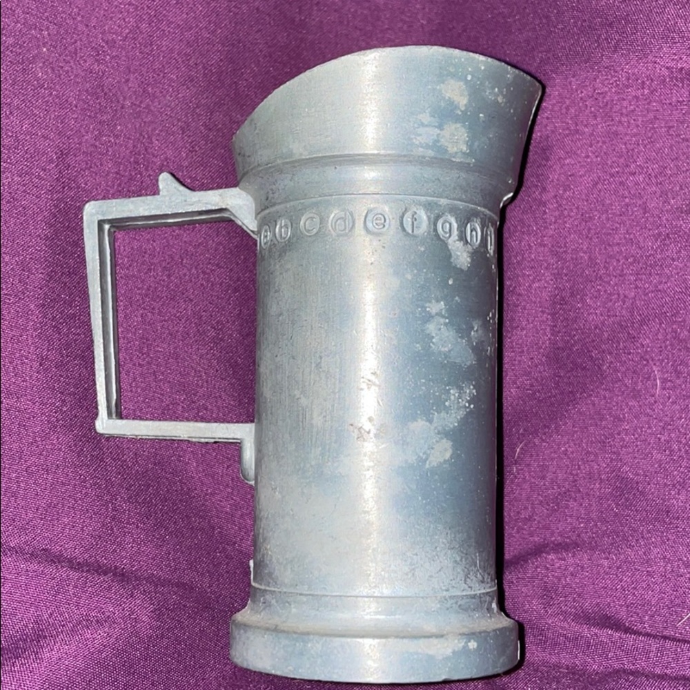 Pewter measuring pitcher collectable from Italy